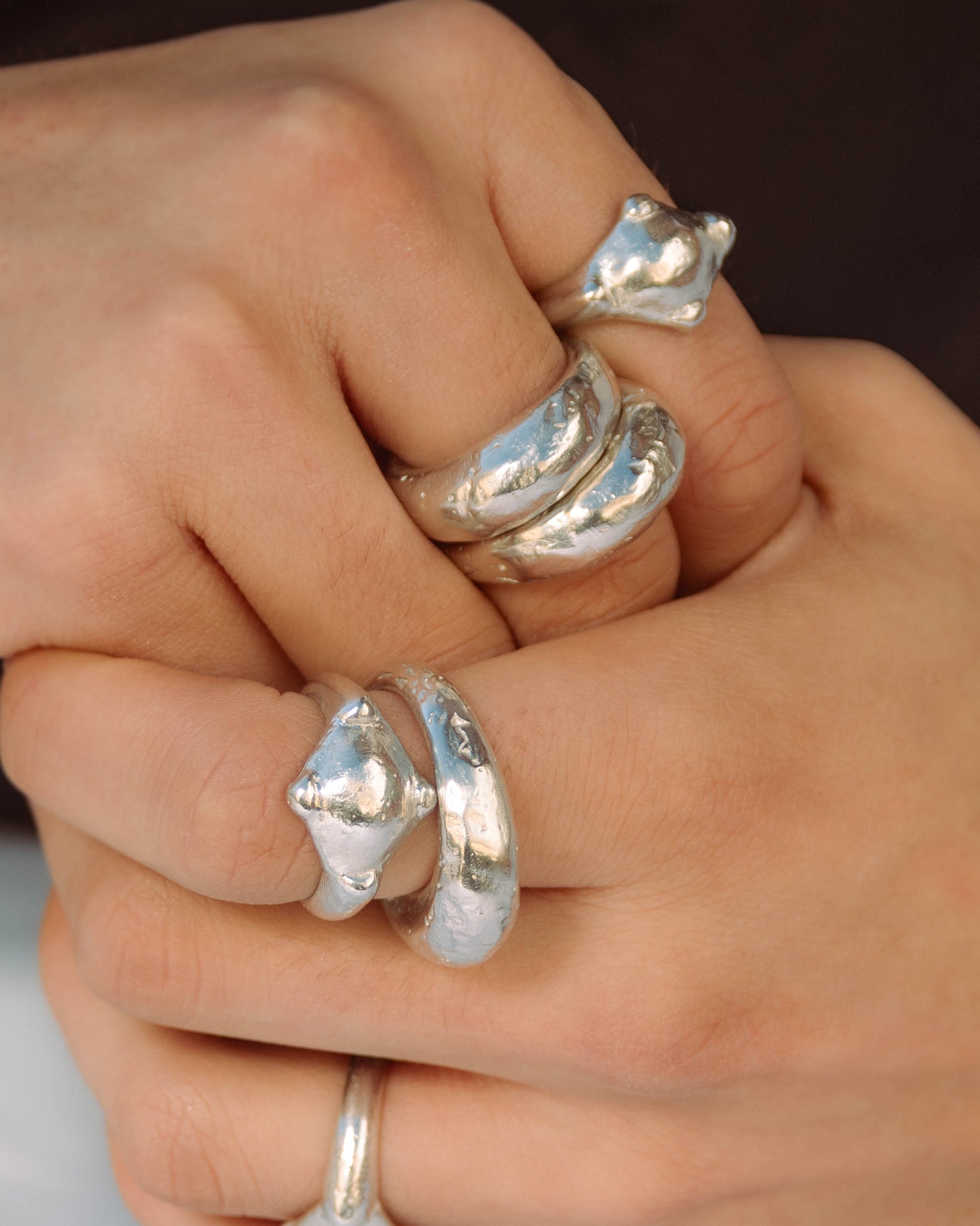 Big tall silver ring and silver ring with a compass shape