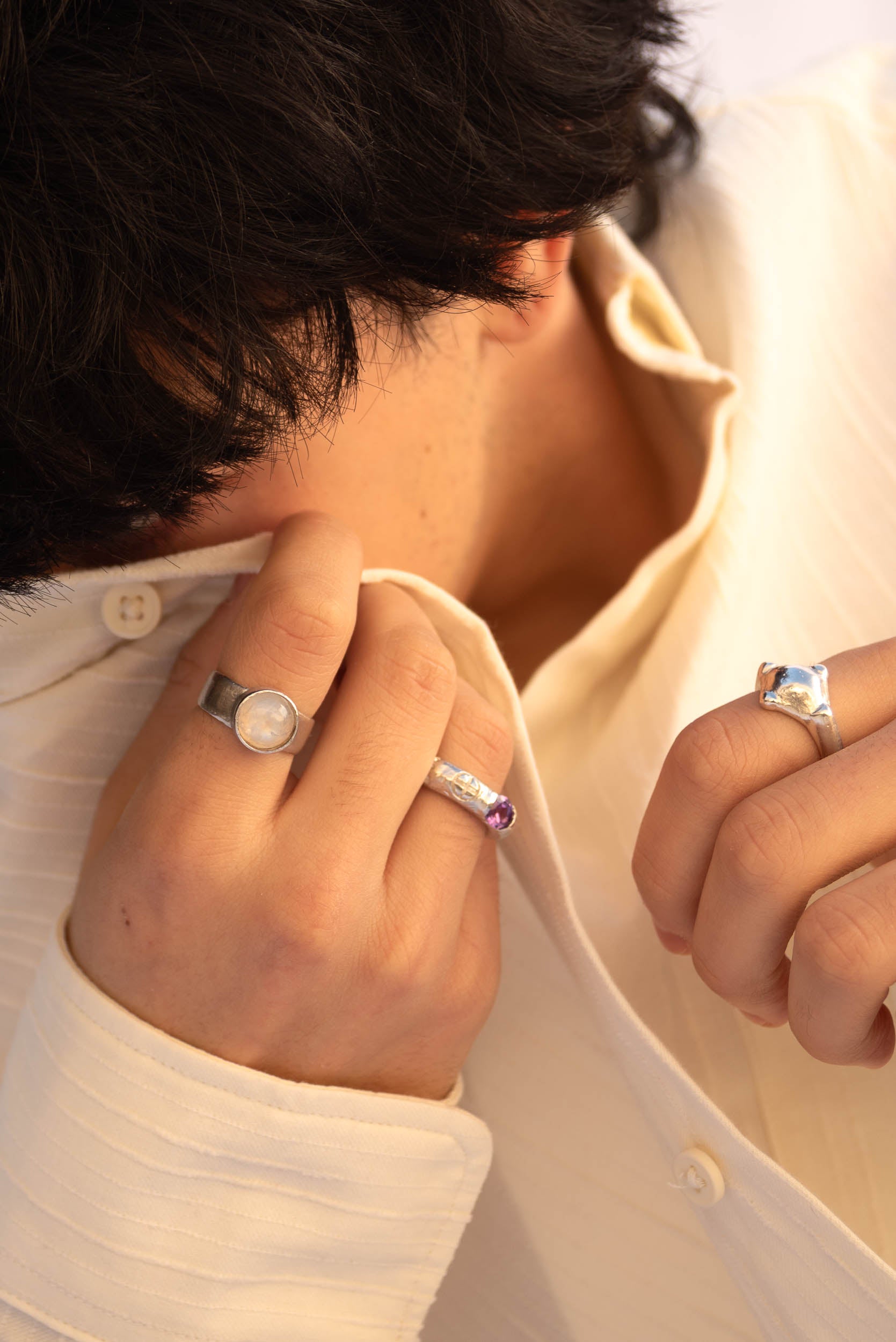 silver ring with moonstone and other two silver rings