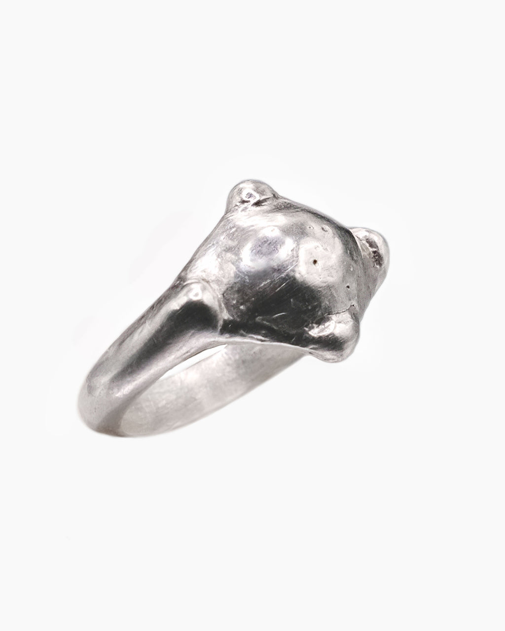 Silver ring with a compass shape